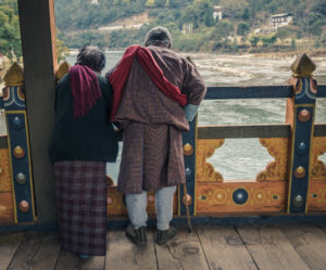 Couple looking at the fish in Punakha Bhutan