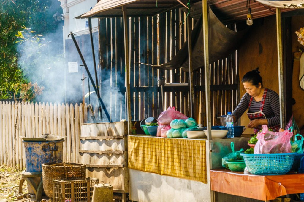 Woman cooking in Luang Prabang, Laos